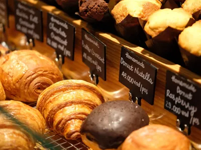Fresh croissants and scones in the pastry case